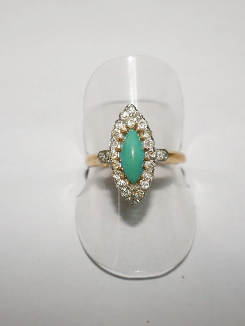 Null Marquise ring in gold and platinum, with a turquoise in a diamond setting, &hellip;