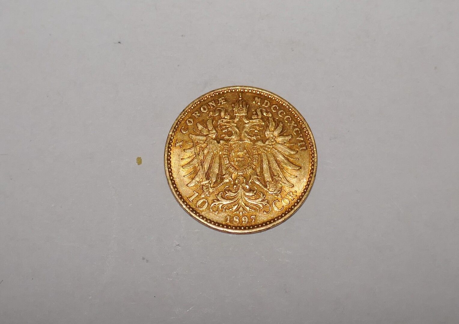 Null Una moneda de oro de 10 Corona 1897, 3,4 grs
