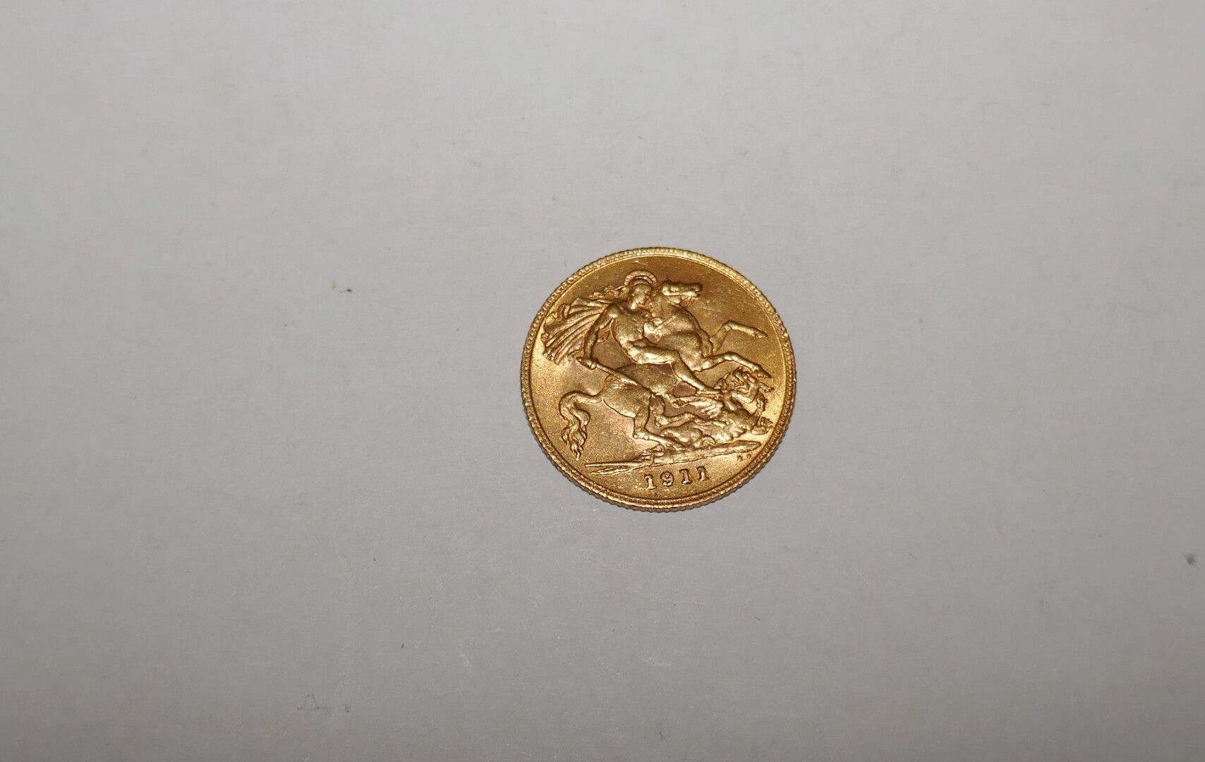 Null Un medio soberano de oro de Georges V de 1911, 3,99 grs.