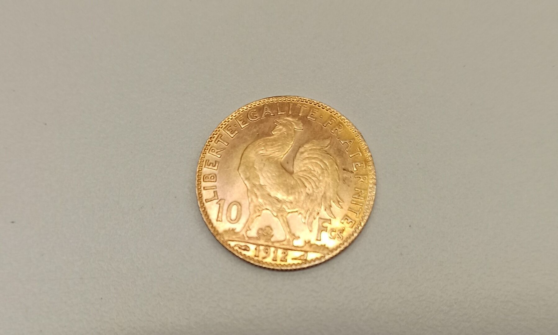 Null 1 gold coin of 10F Coq - Weight 3,3g