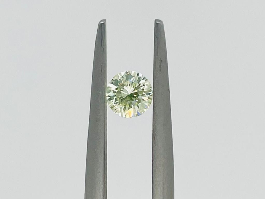 Null 钻石0.29克拉，黄绿色，纯度SI1 - 明亮式切割 - 证书编号 - F20303-7