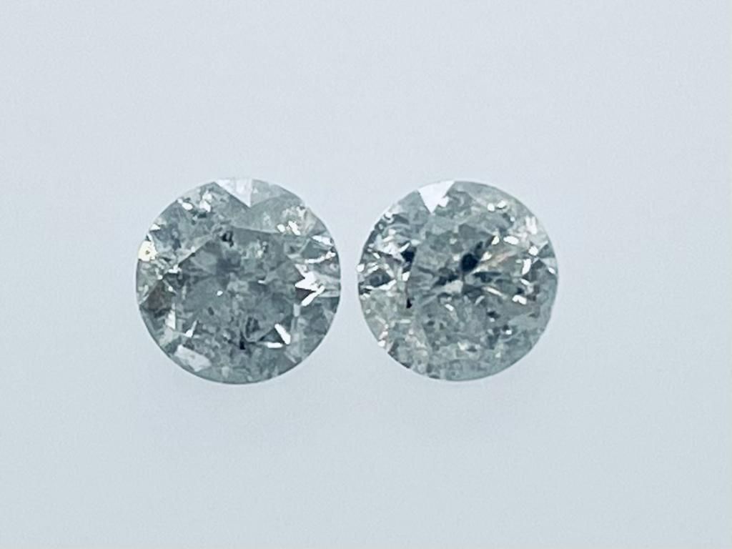 Null 2颗总重1.06克拉的钻石，G-H - i2-3 - 明亮式切割 - 证书编号 - C21220-8