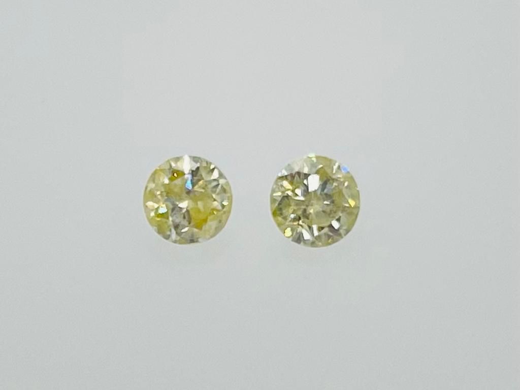 Null 2颗钻石0.62克拉彩黄-i1-2-明亮型切割-F20305-15