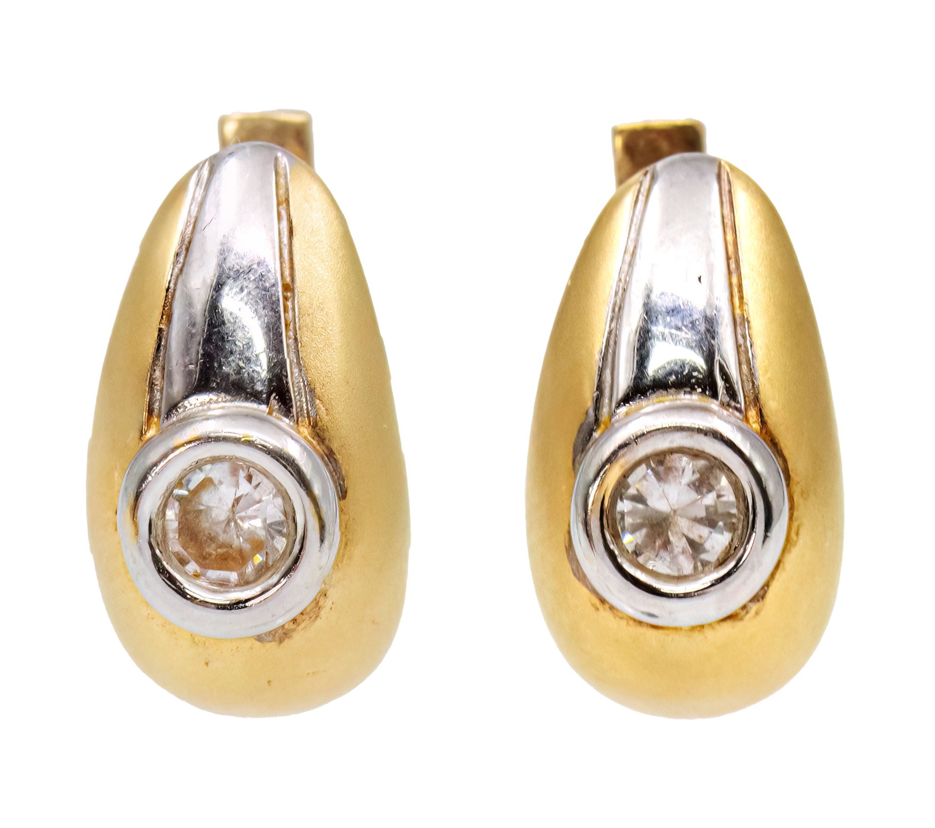 Null Pair of 14k Yellow and White Gold Earrings.
Set with CZs.
Marked. 
16.5x9mm&hellip;