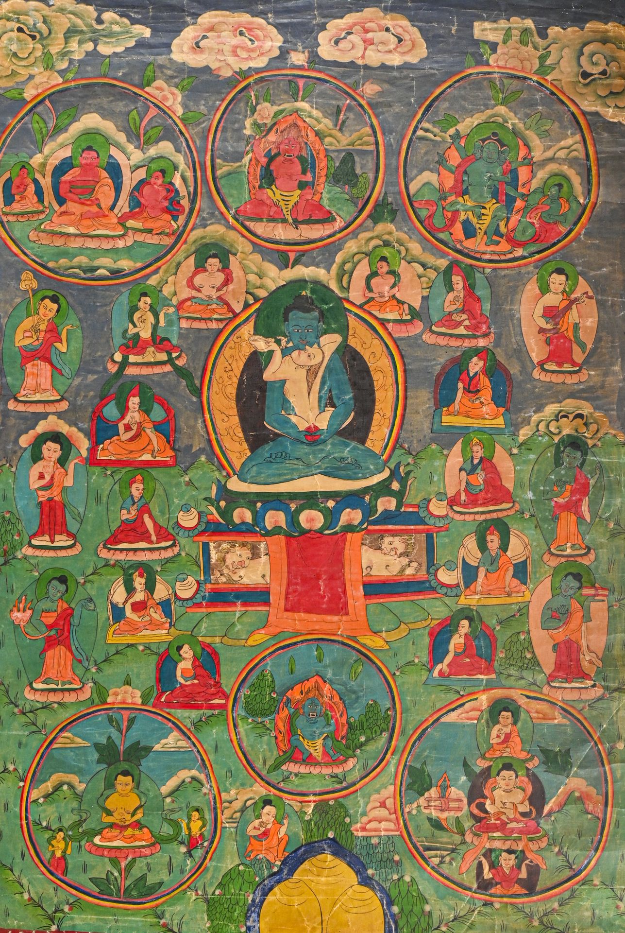 NEPAL - Vers 1900 代表爱神的唐卡在曼陀罗中，装饰着象征欲望火焰的涡旋，周围是天体的等级制度。

H.75 cm - L. 50 cm AS