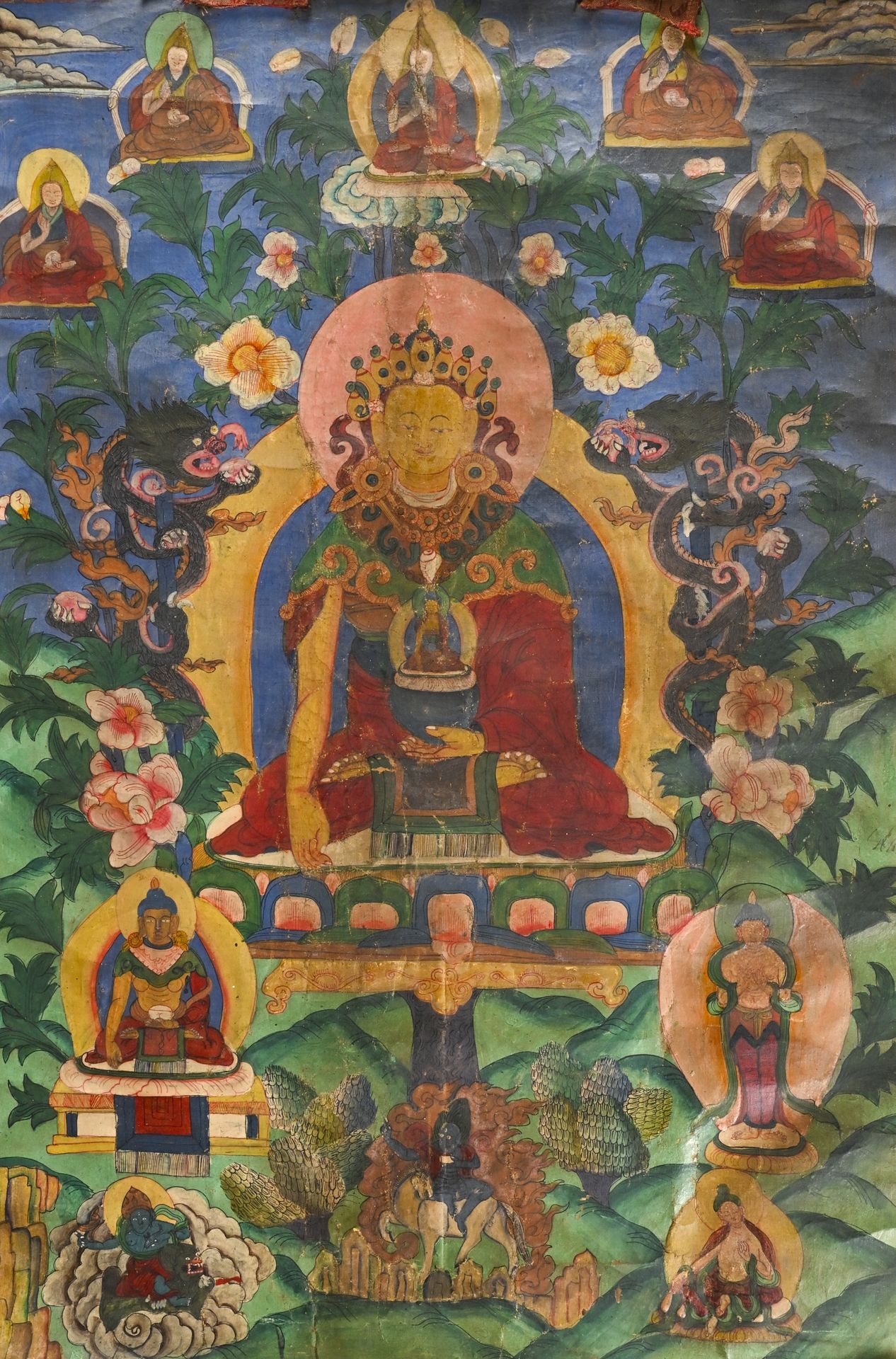 TIBET - XIXème siècle 唐卡表现的是身穿红色袈裟的观音，手持水晶球，上面坐着佛祖。他被呈现在一棵树上，被两条龙包围。

H.72 cm - &hellip;