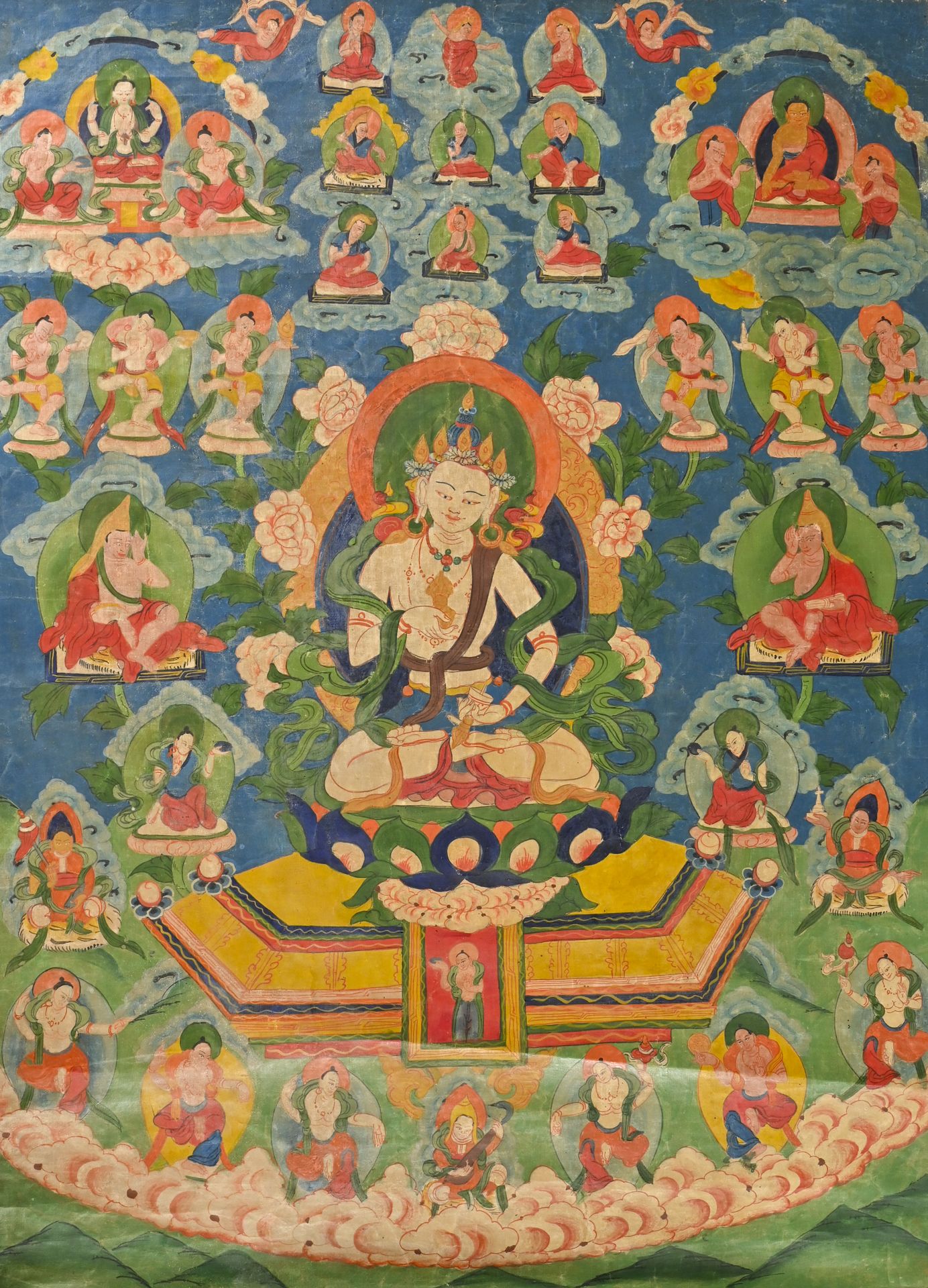 HIMALAYA - fin XIXème siècle 唐卡代表一个被僧侣和天体等级制度包围的女神

H.72.5 cm - W. 54 cm AS