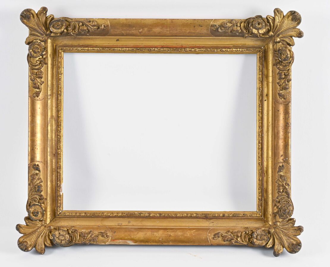 Null Small rectangular wood and gilded stucco frame, with large flowered corner &hellip;