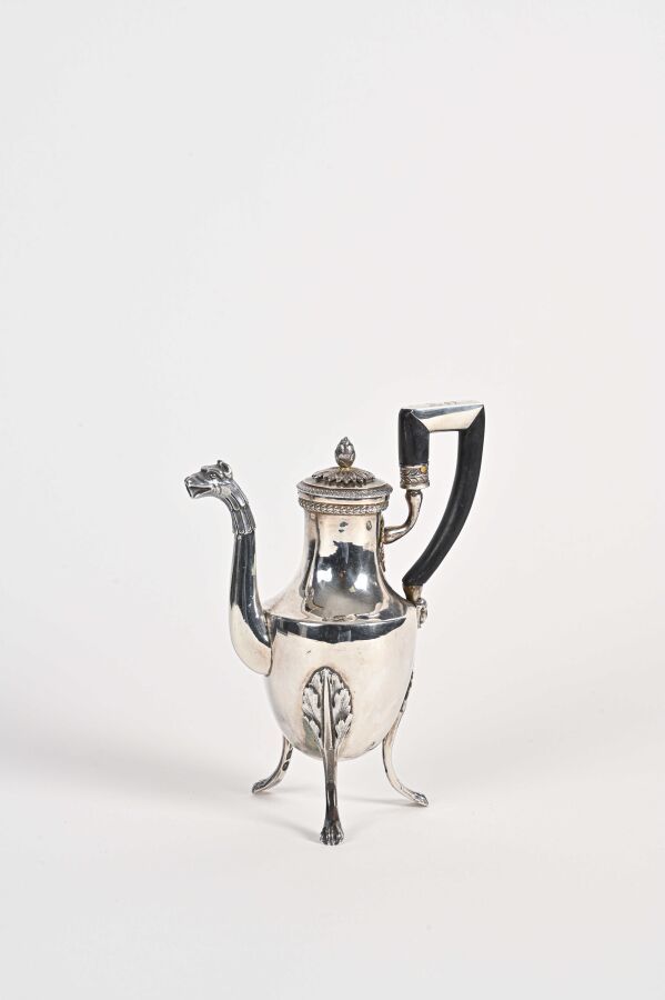 Null A silver baluster self-serving coffee pot on three claw feet with a leafy a&hellip;