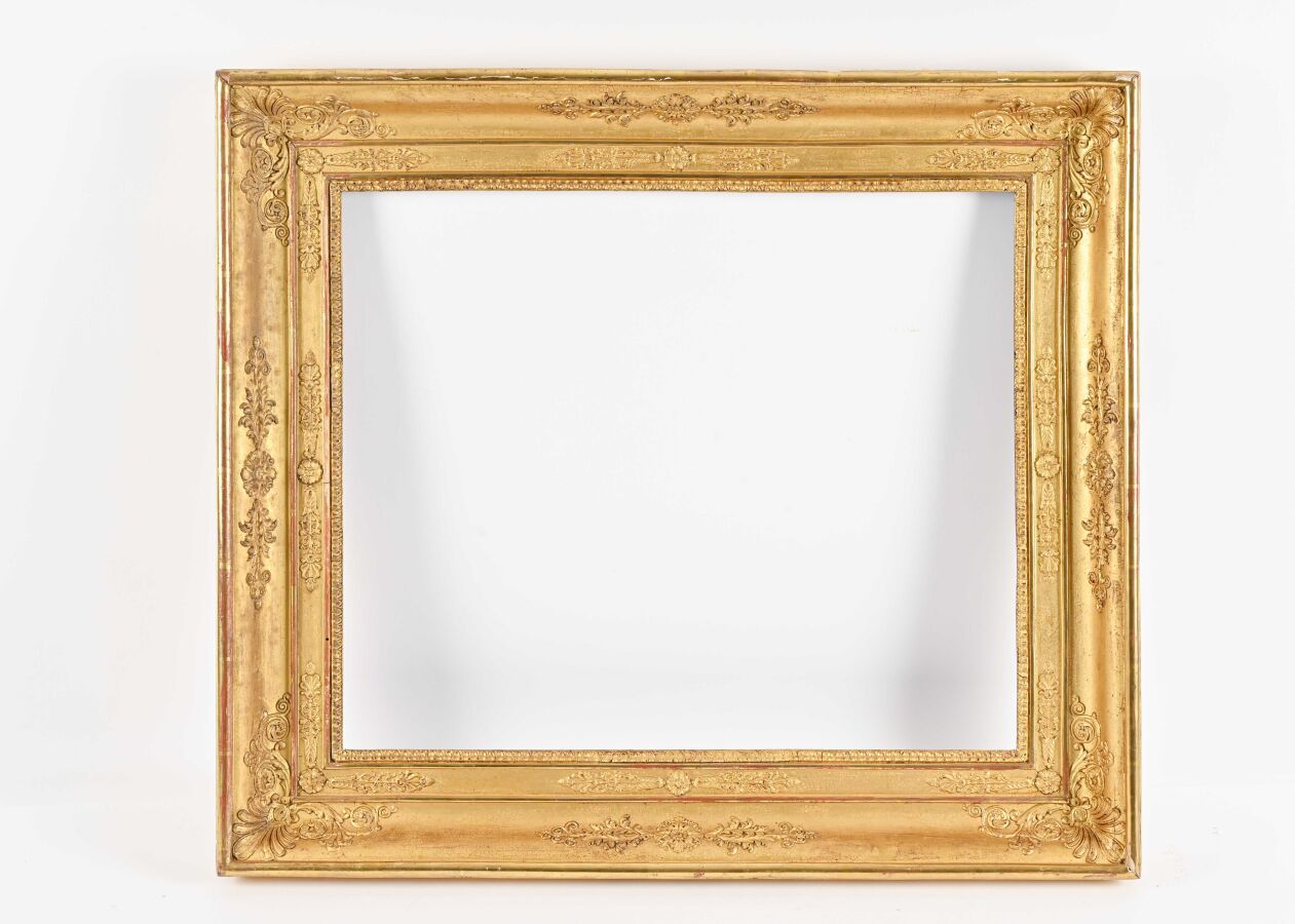 Null Wood and gilded paste frame with a double frame of palmettes, rosettes and &hellip;