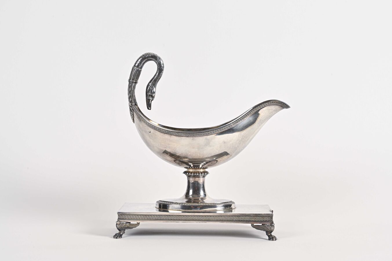 Null A very important plain silver swan-neck gravy boat on a pedestal; rectangul&hellip;