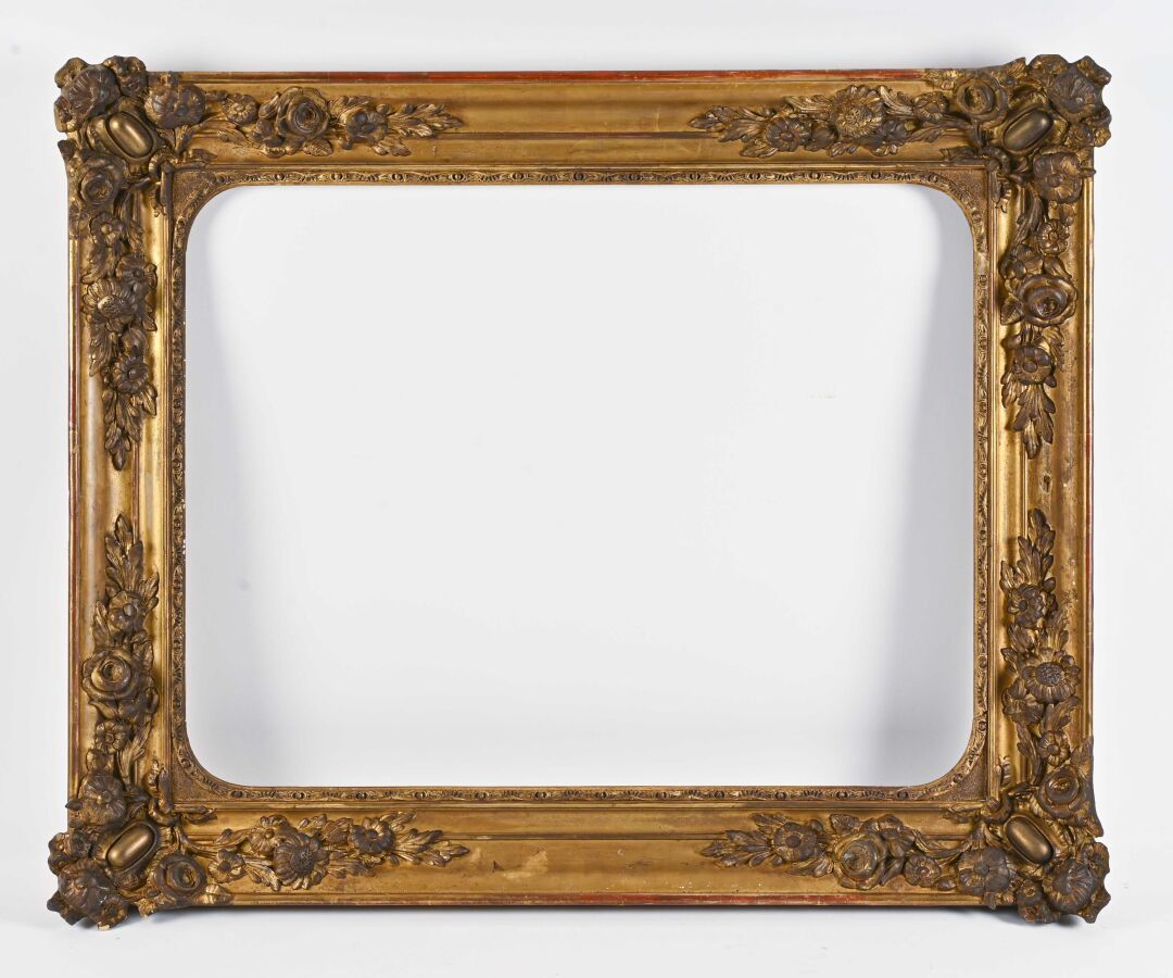 Null Rectangular wood and gilded stucco frame decorated with flowery spandrels

&hellip;