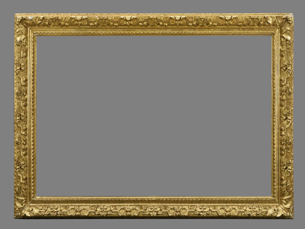 Null Beautiful wood and gilded stucco frame with Bérain decoration on a trellis &hellip;
