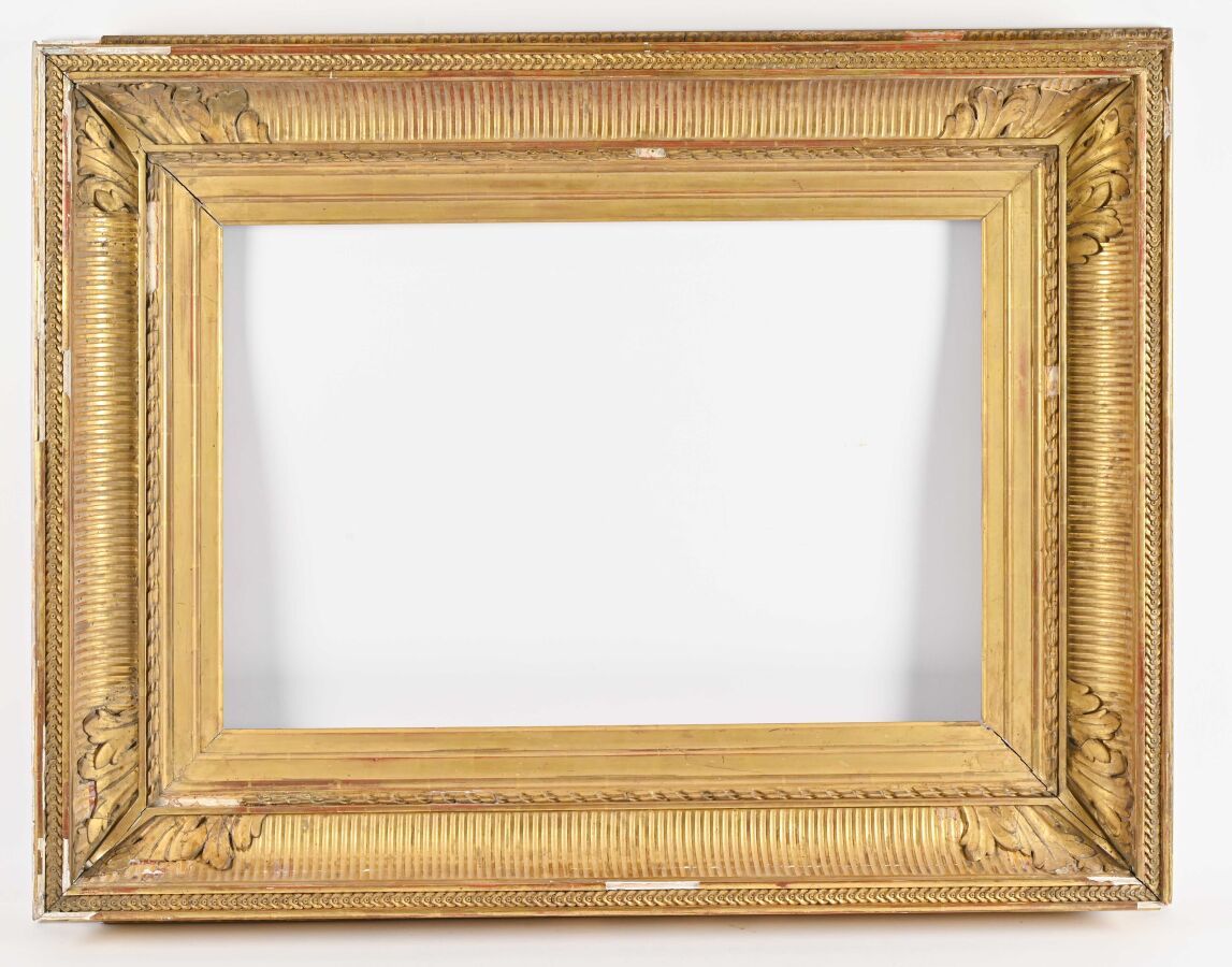 Null Rectangular wood and gilded stucco frame with canals, laurel twists, foliat&hellip;