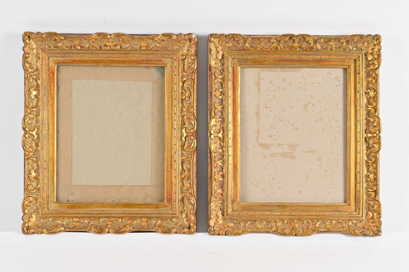 Null Pair of rectangular wood and gilded stucco molded frames in the Berain styl&hellip;