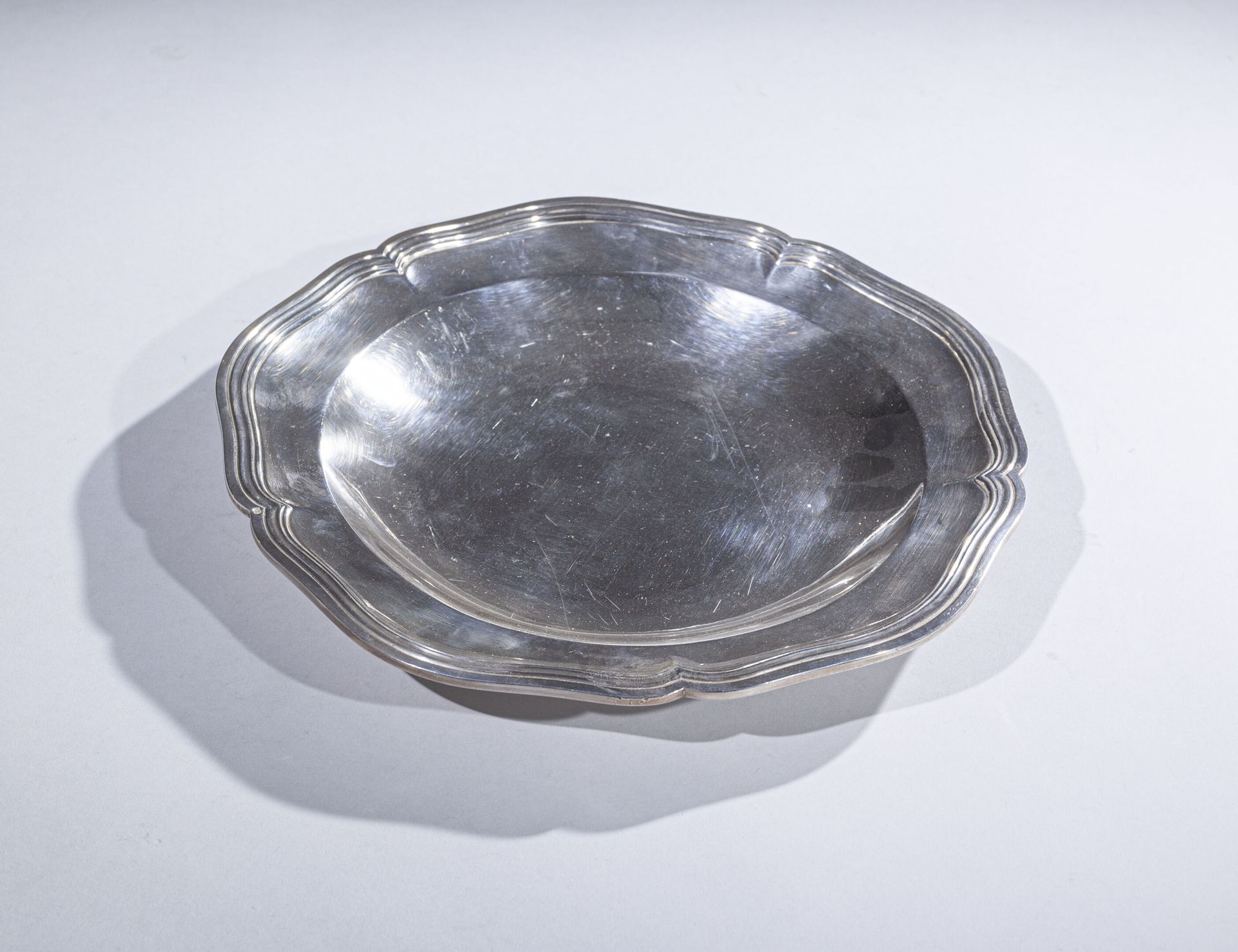 Null Circular silver dish with five contours molded with fillets

Marked: Minerv&hellip;