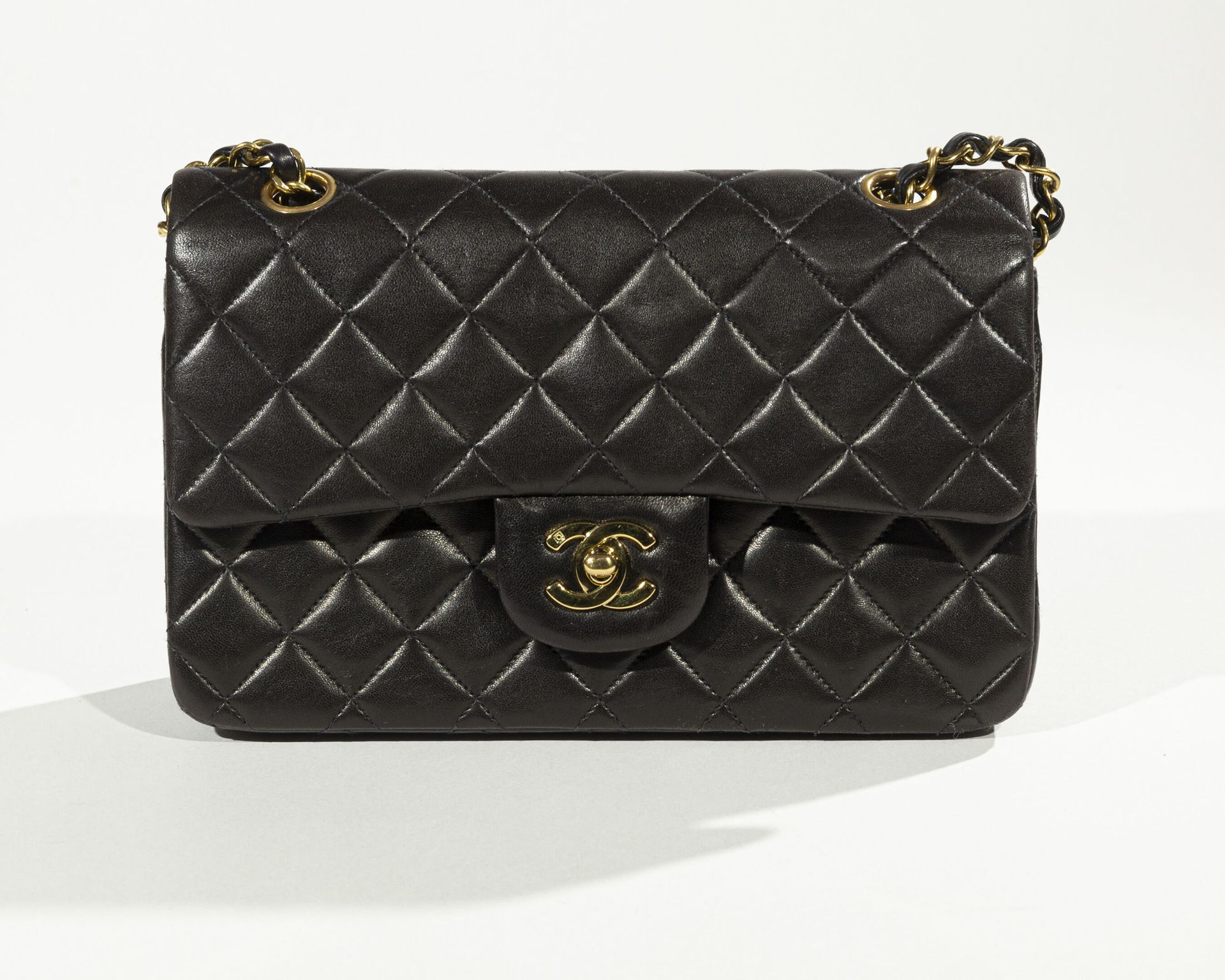 Chanel bag chain shoulder black gold metal fittings matelasse fringe l –  Brandera Luxury Vintage