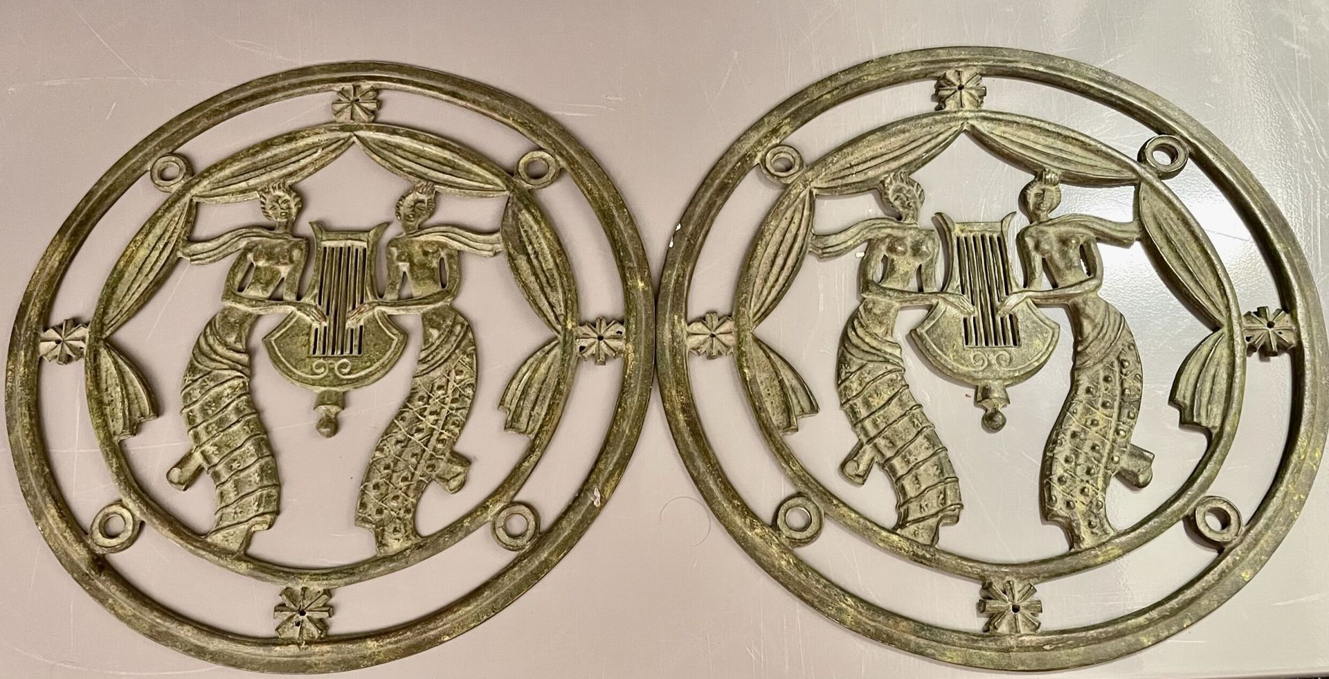 Null Art Deco work

Pair of circular bronze ornaments featuring two female mytho&hellip;