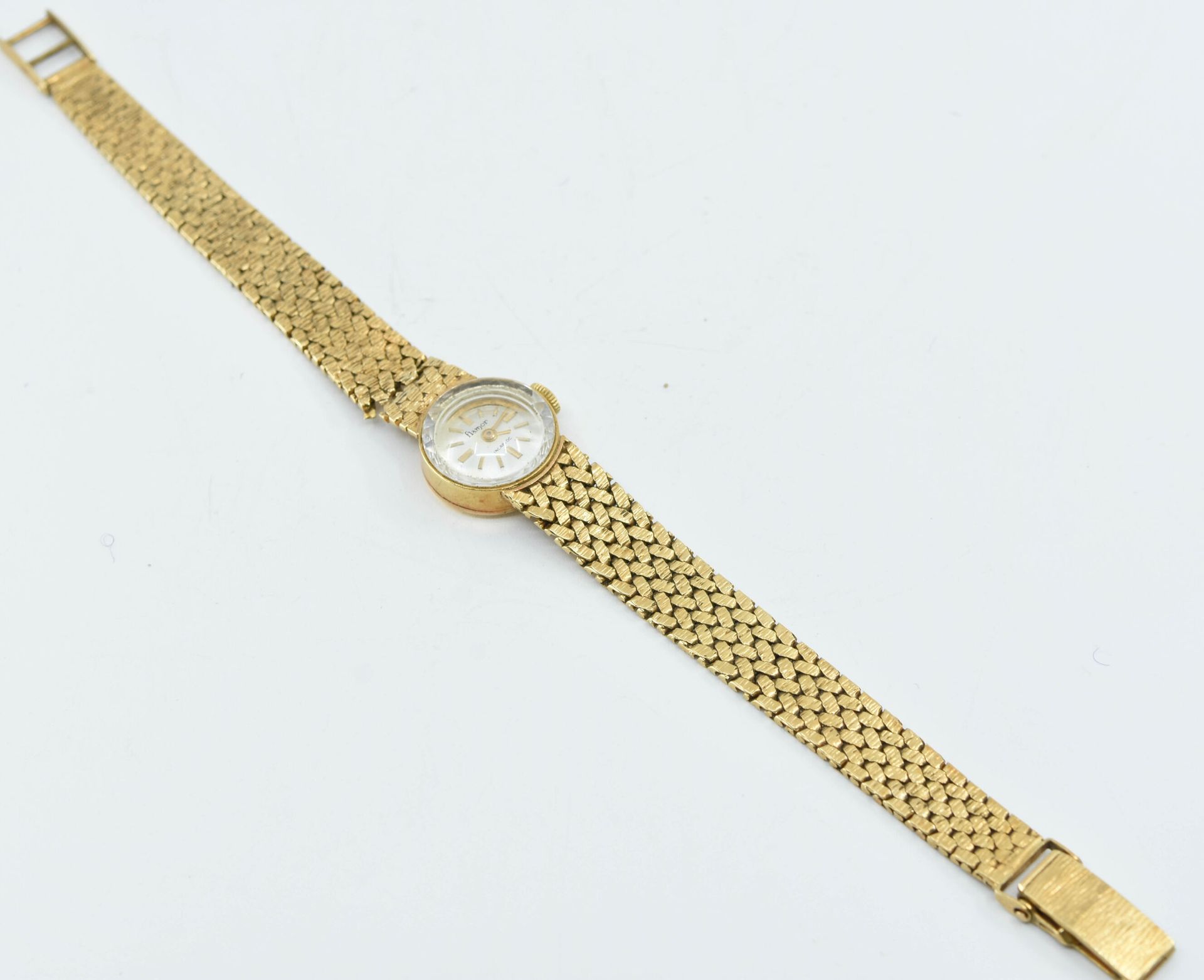 Null FLAMOR
Petite montre de dame en or jaune 18K (750°/°°), cadran nacré, brace&hellip;