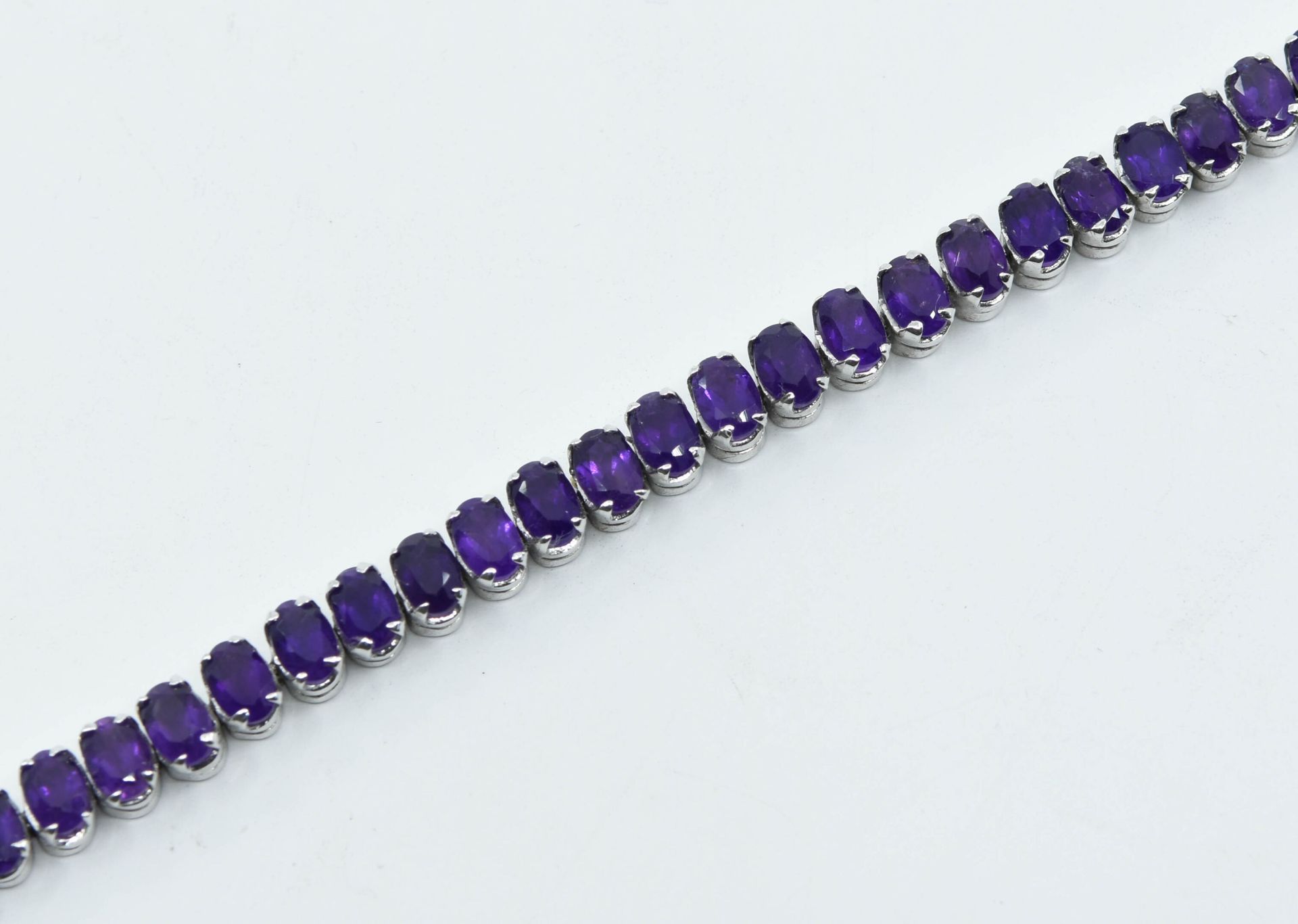 Null Silver bracelet set with amethysts 
Gross weight : 14,8 - L. 19 cm