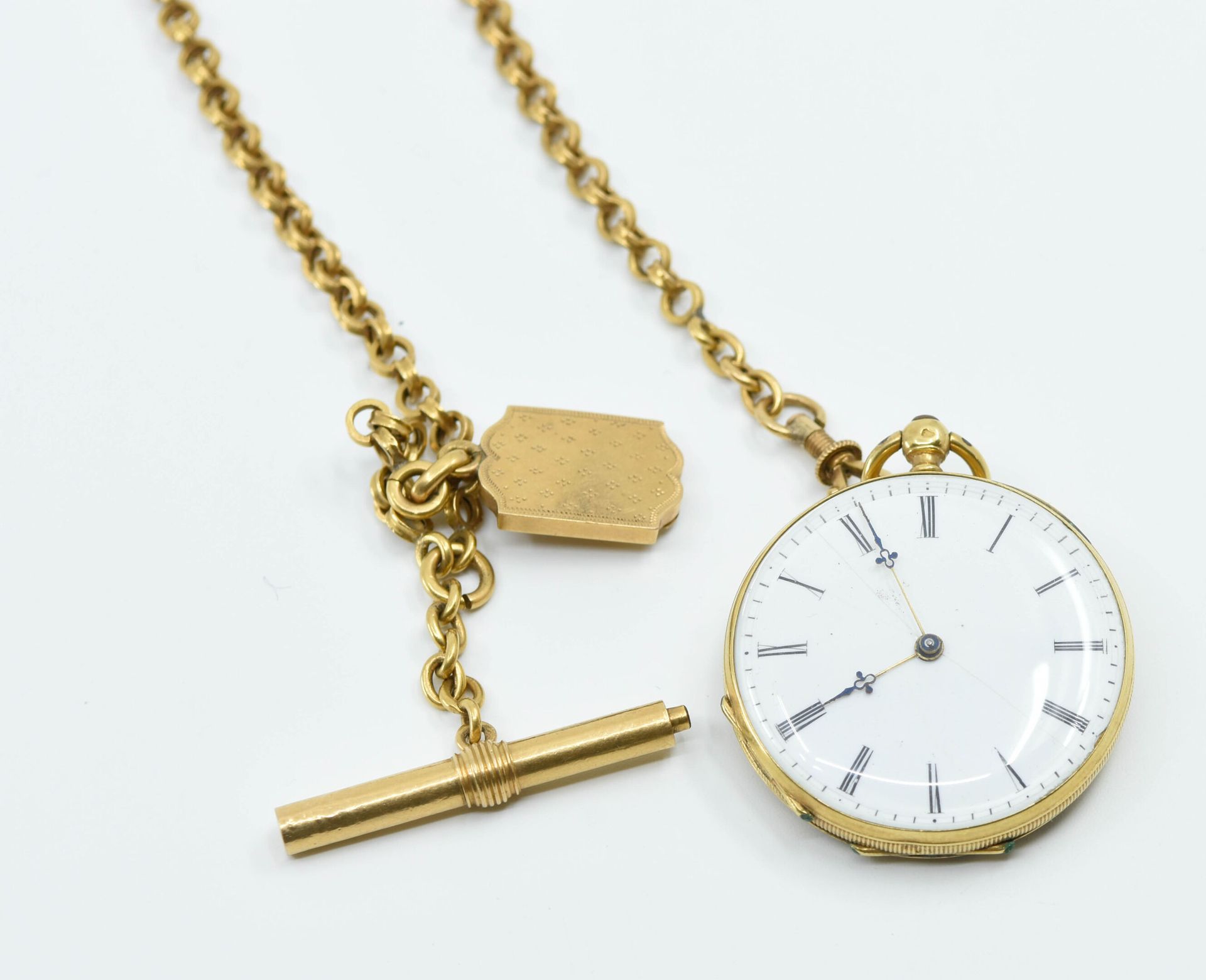 Null Montre de poche en or jaune 18K (750°/°°), le dos guilloché à décor de feui&hellip;