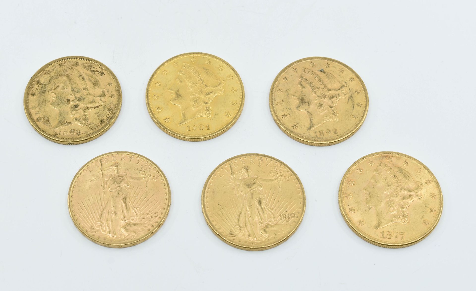 Null 美国
拍品包括六枚20美元金币，其中两枚是1910年和1913年的圣高登斯型，以及四枚20美元自由头型金币 
总重量 : 200,5 g 
磨损和撕裂&hellip;