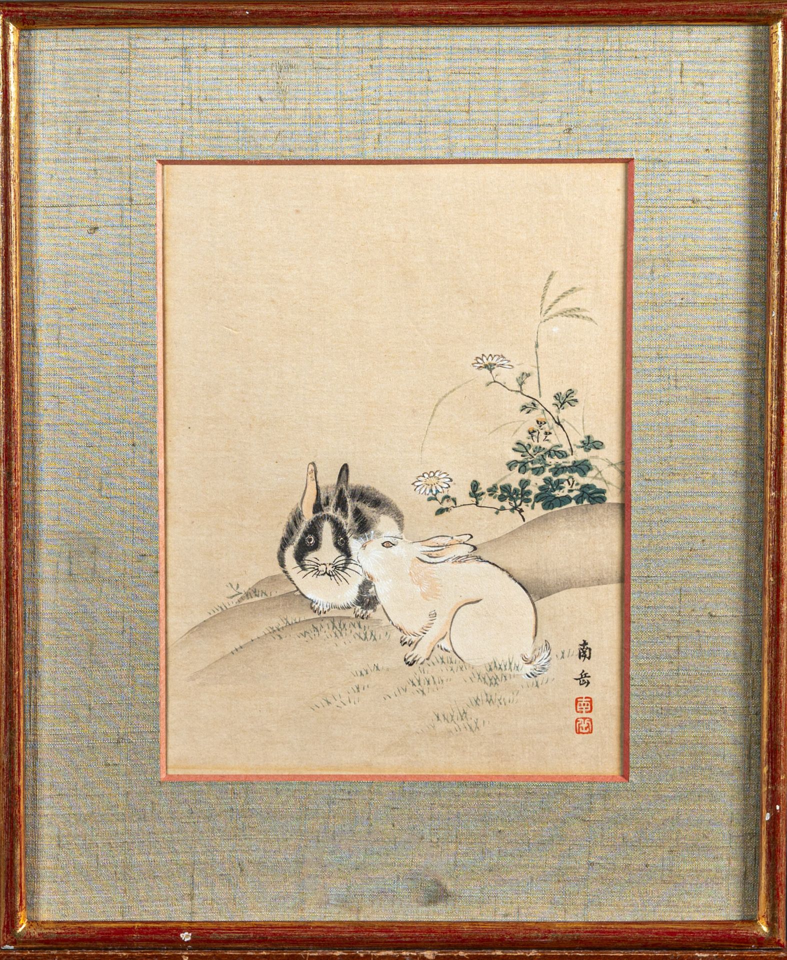 Null 渡边南乐（1767-1813 年），日本
表现两只兔子和一些花草的版画，右下方有 Nangaku 的签名和两个印章，有框，无玻璃。
H.22 厘米 -&hellip;