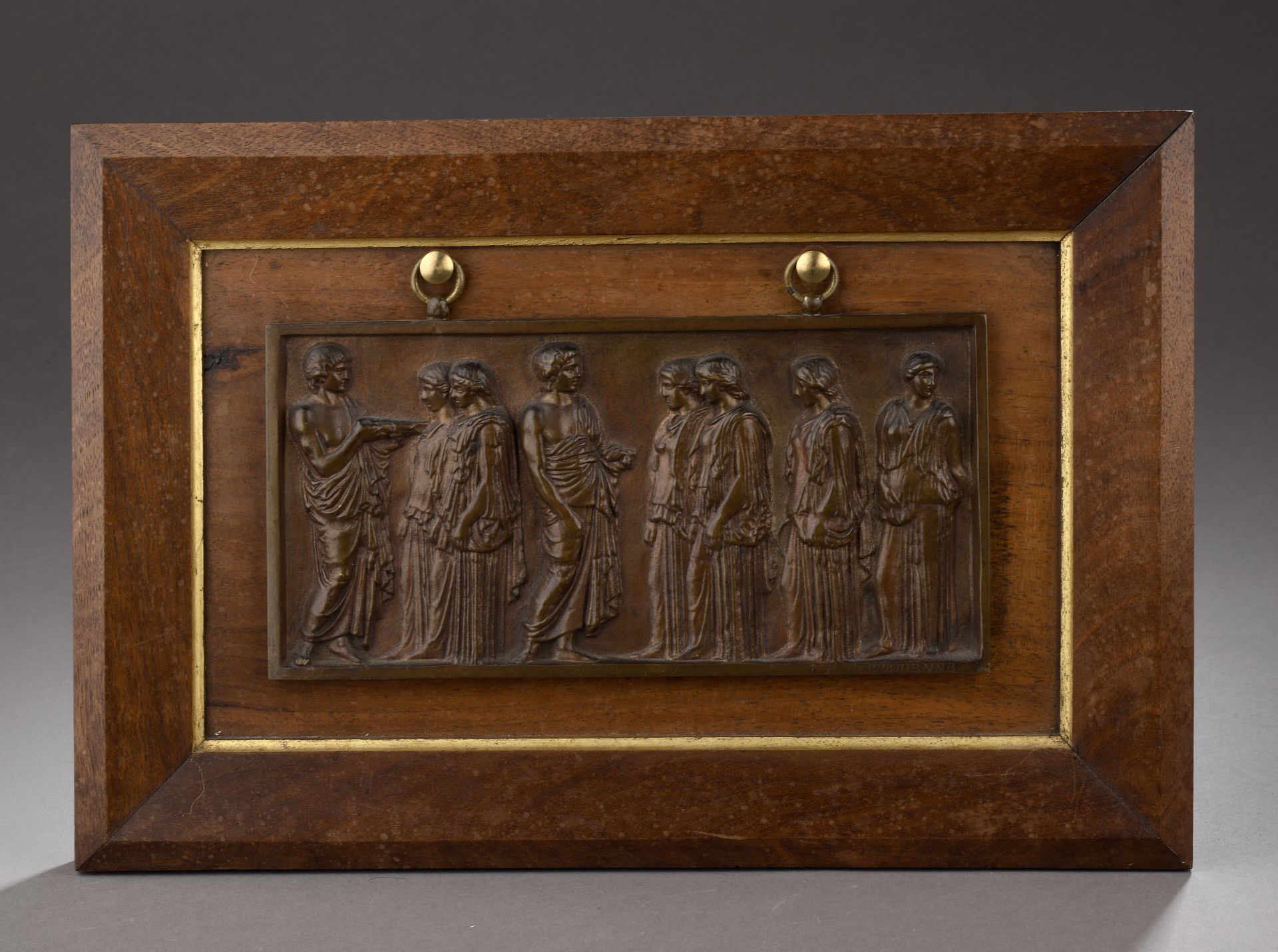 Null Bronze plaque with patina, decorated in bas-relief with a procession featur&hellip;