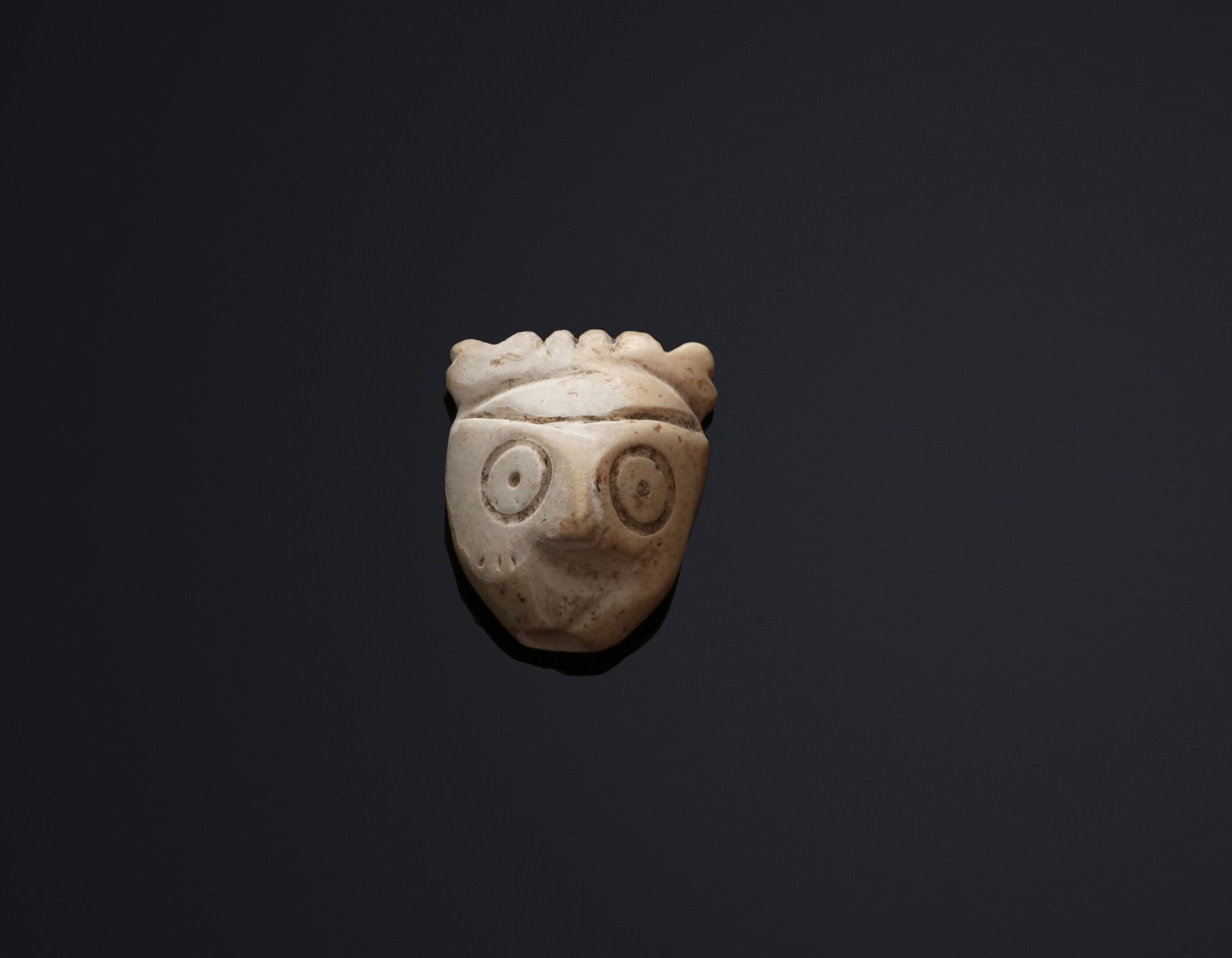 Null Amulette pendentif en forme de tête humaine.
Mésopotamie, époque des Dynast&hellip;