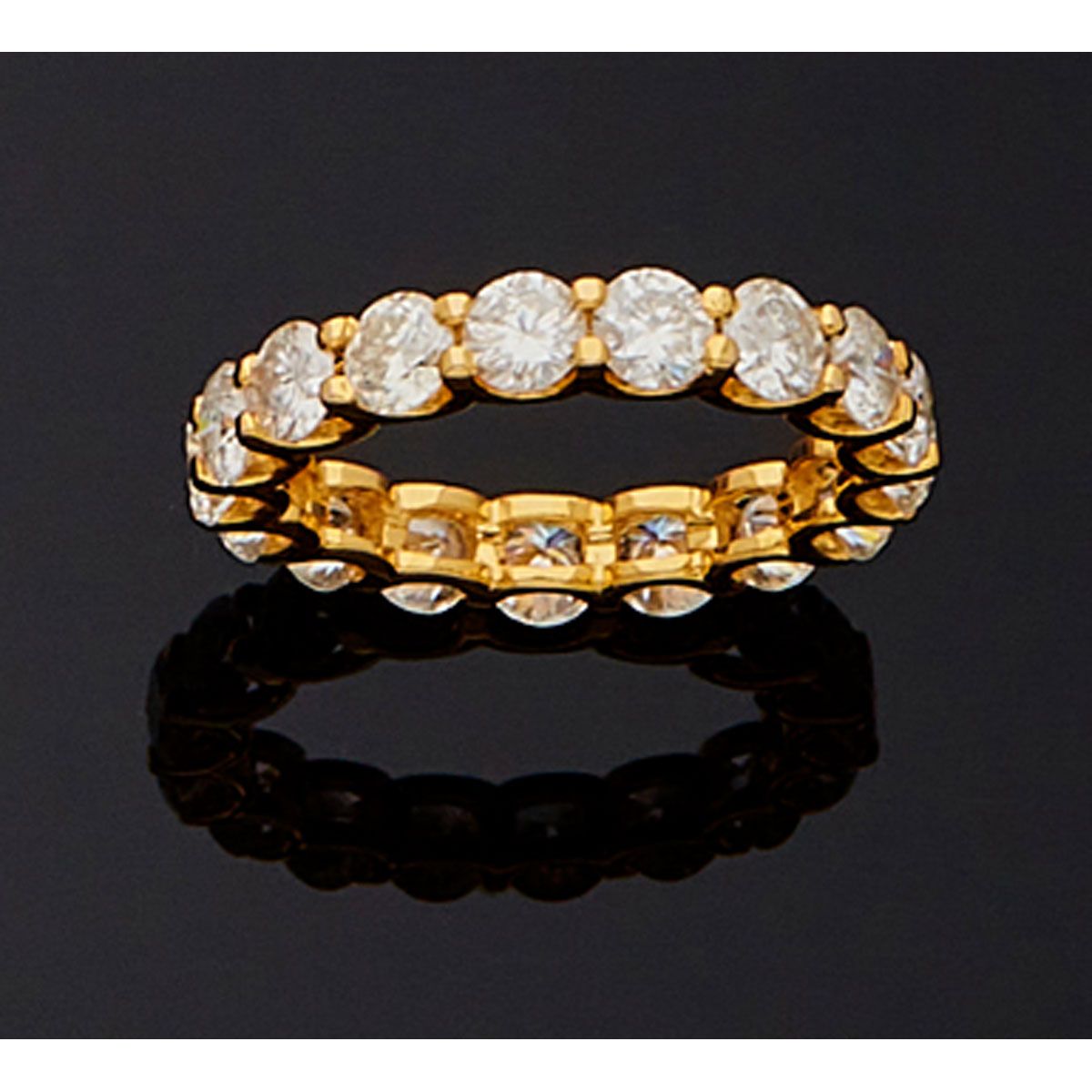 Null Ehering aus 18 K Gelbgold mit 17 Diamanten von je 0,23 Karat.

B.P. 3,45g. &hellip;