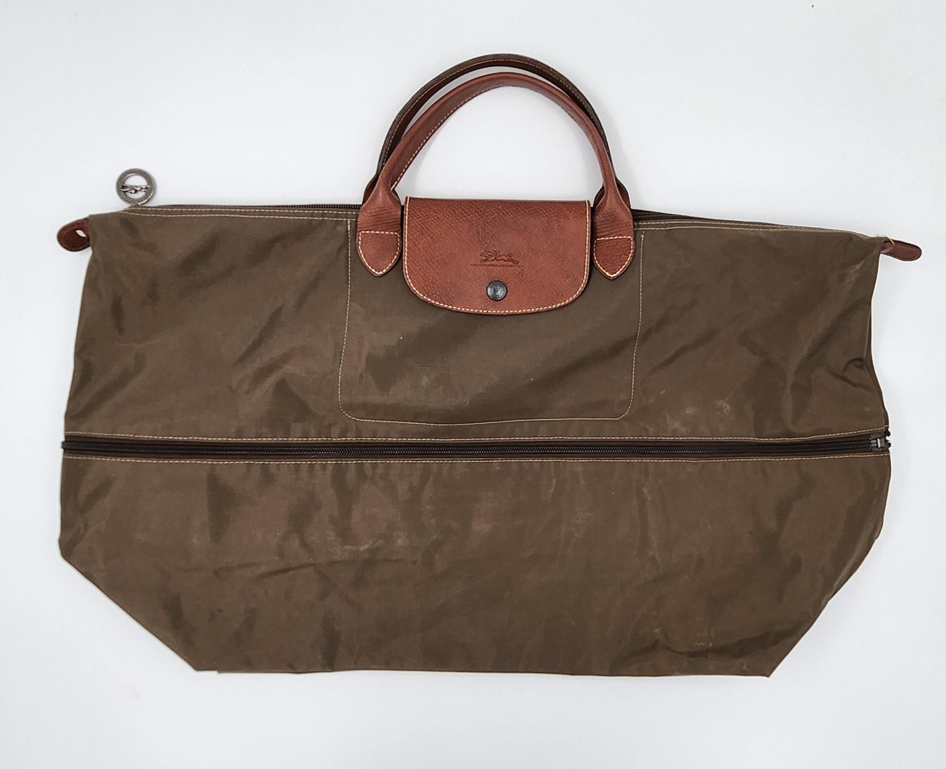 Null LONGCHAMP.
Pliage extensible travel bag in brown canvas and natural leather&hellip;