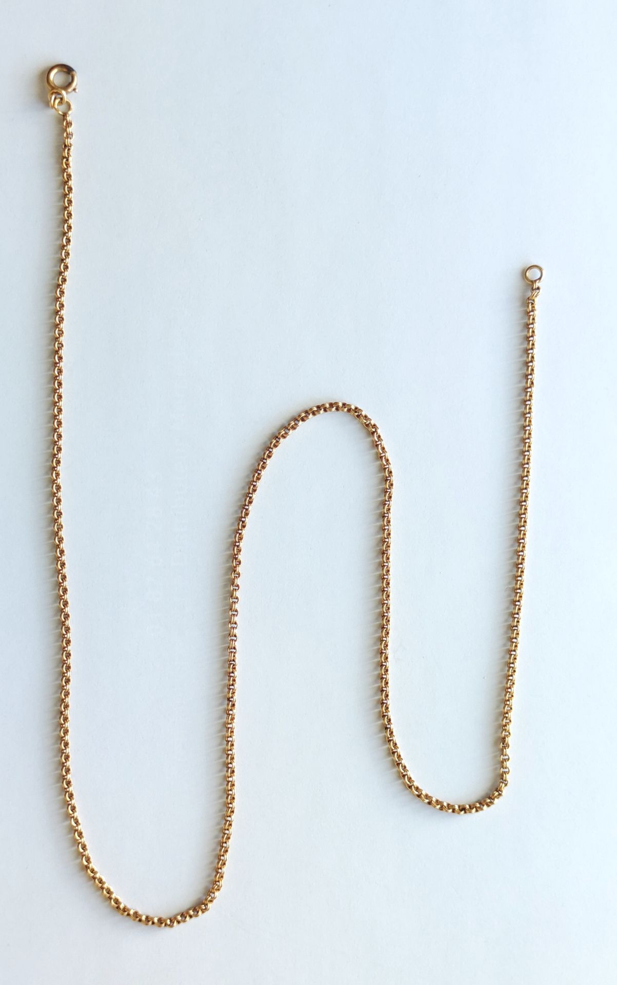 Null 
750°/°黄金链，有两个神棍的链接
长度：54厘米 重量：10.7克