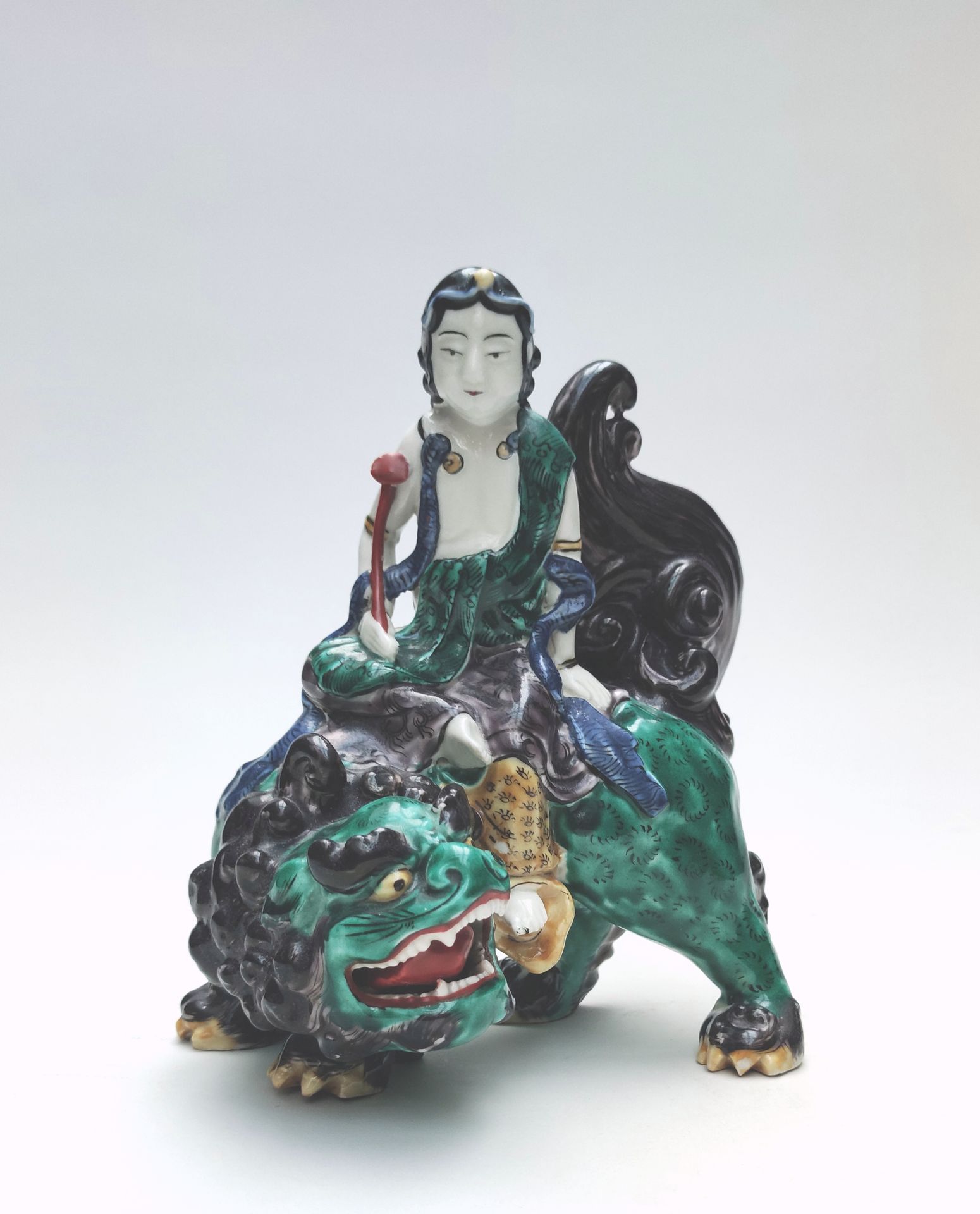 Null 
GLazed ceramic SUBJECT representing a divinity sitting on a chimera, China&hellip;