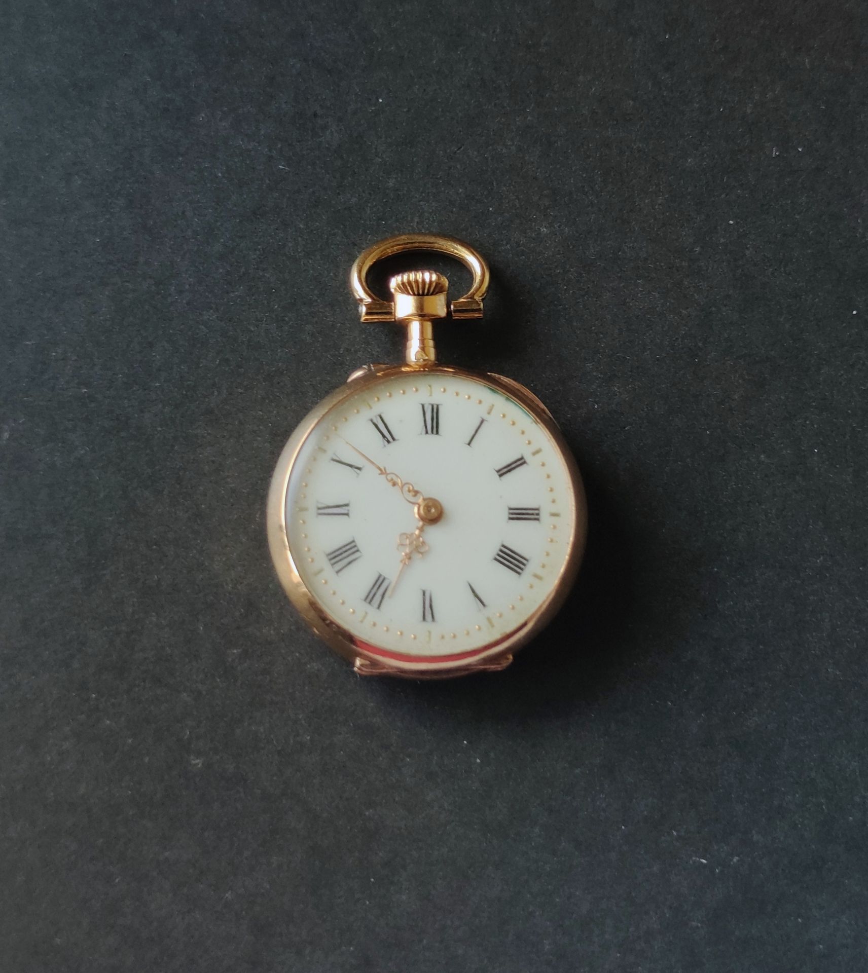 Null MONTRE pendentif de Dame en or jaune 750°/°° , mouvement mécanique Poids br&hellip;