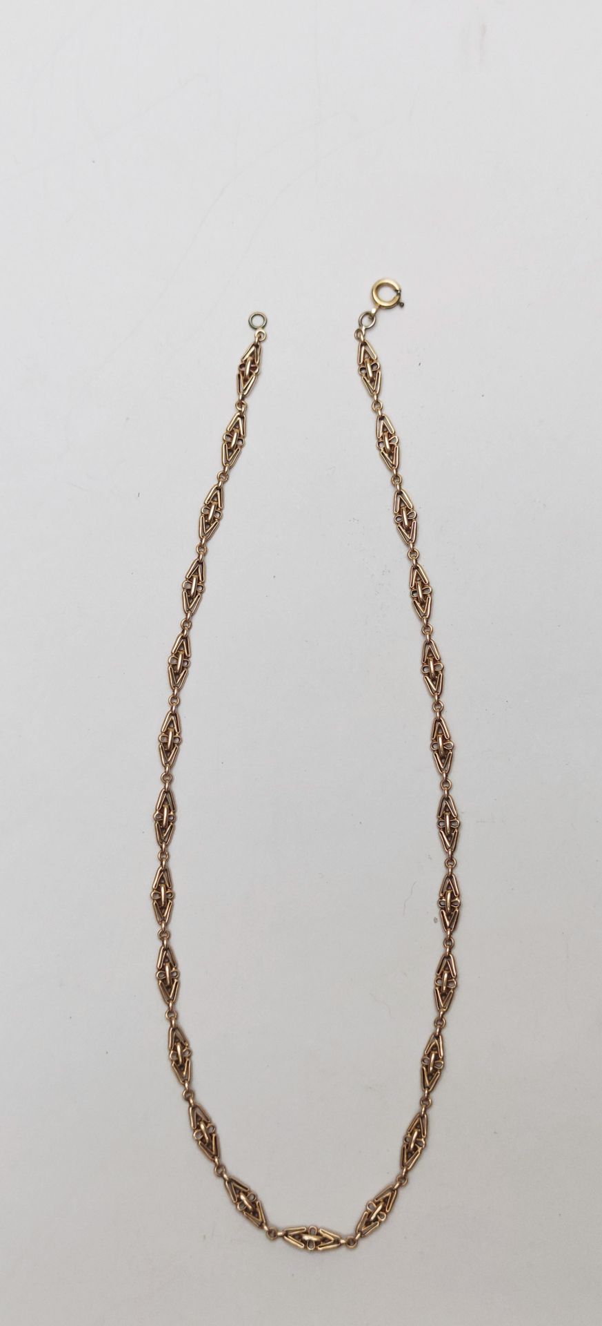 Null 
Necklace in yellow gold 750°/00 with 25 links 




weight : 11.6 g