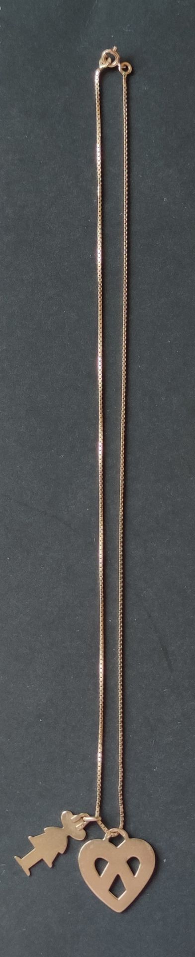Null 黄金750°/00 "心形和轮廓 "链和两只手镯

重量：8.6克