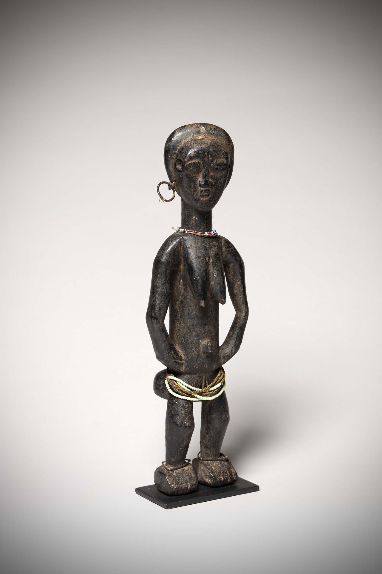 Null Agni 

( Ivory Coast ) Very old female statuette with black lacquer patina &hellip;