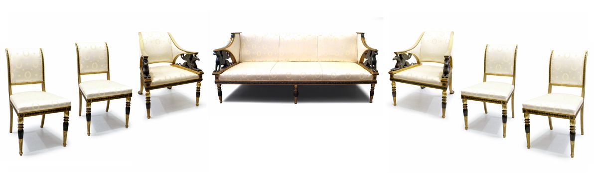 IMPORTANT SALON D'EPOQUE EMPIRE 
在雕刻的鎏金木和黑漆，由一个沙发，两个扶手椅和四个椅子组成。19世纪的意大利作品。