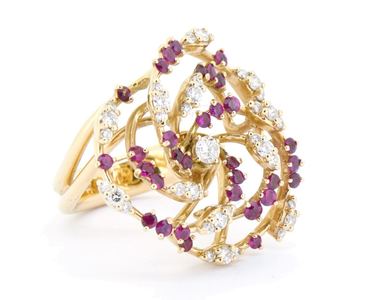 BAGUE SPIRALE An 18k yellow gold ring of spiral design set with round rubies and&hellip;