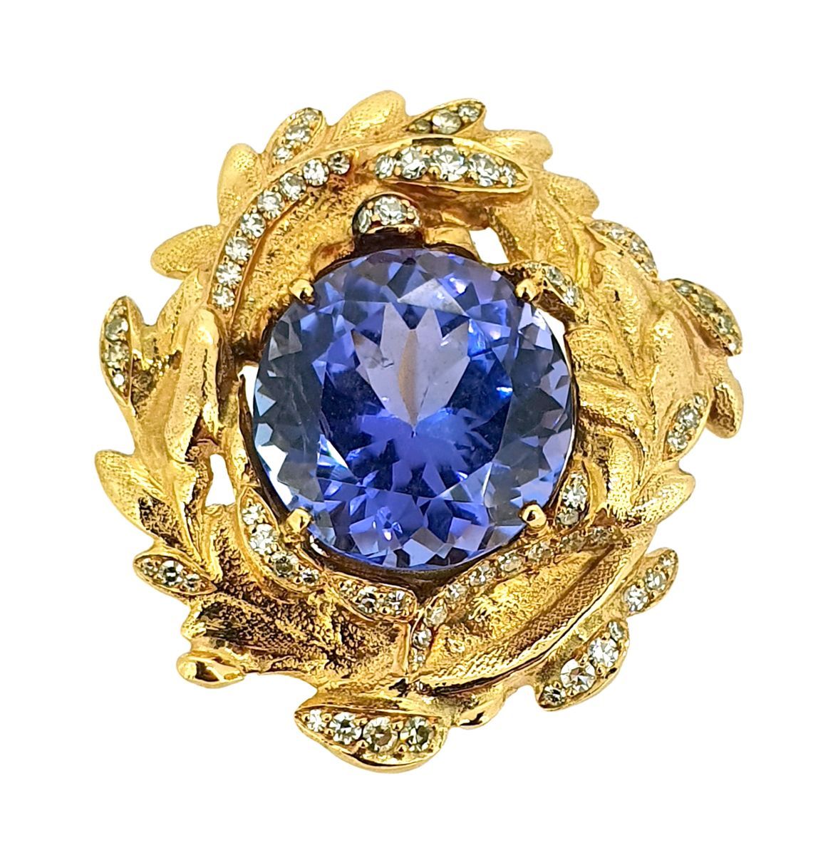 BAGUE TANZANITE An 18k (750) yellow gold ring set with a round tanzanite in a fo&hellip;