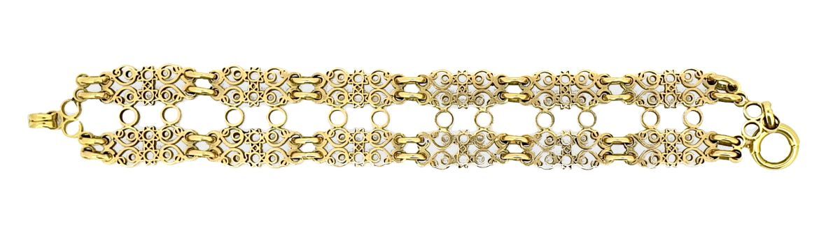 BRACELET SOUPLE 
9k(375)金合金，由两排丝状链接的链子组成。

毛重：35.6克 - 长度：16厘米

出处：富尔奇隆庄园，蒙特卡洛