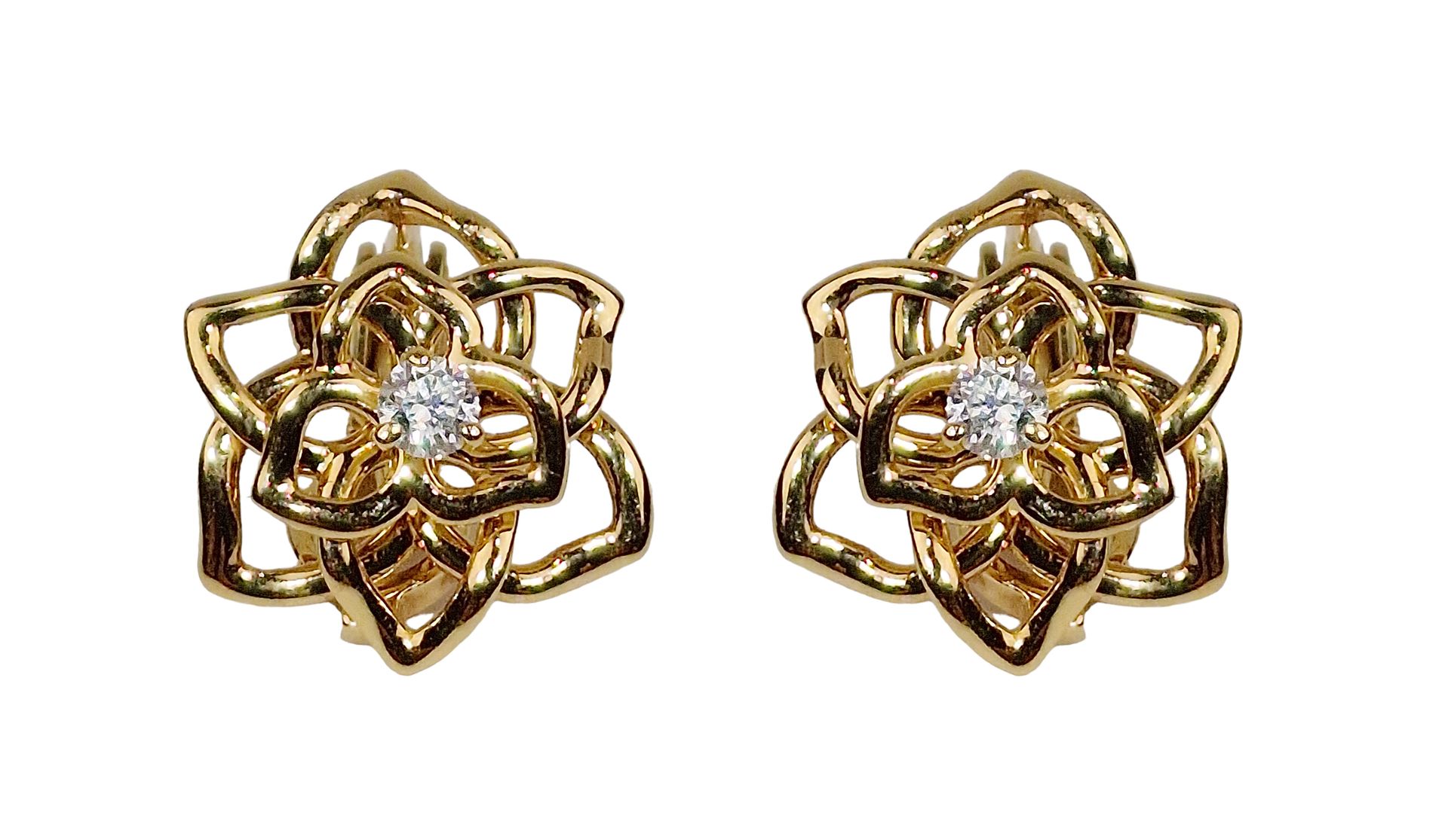 PIAGET Paire de clips d'oreilles In 18k (750) rose gold, stylized with a flower,&hellip;