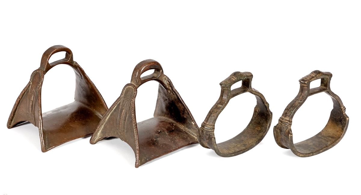 Null Set of two Indian bronze stirrups 
Eighteenth century 
Heights: 14 and 12 c&hellip;
