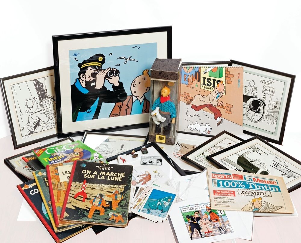 Hergé : 杂项：丁丁拍卖会：4本相册，3本杂志，1份报纸，1本日历，大量的明信片，大量的图片框架，10个框架，1个瓷娃娃，1个针，2个CORNER小雕像，&hellip;