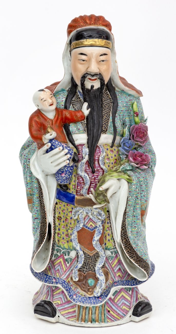 Null 中国，19 - 20世纪
瓷器圣人抱着孩子站在那里。
高度：42厘米