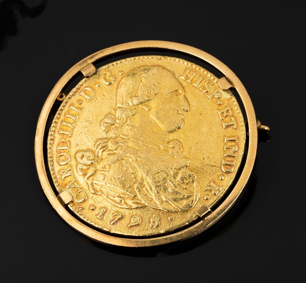 Brosche aus einem Kreis aus 18k Gelbgold (750 Tausendstel), der eine Münze von K&hellip;
