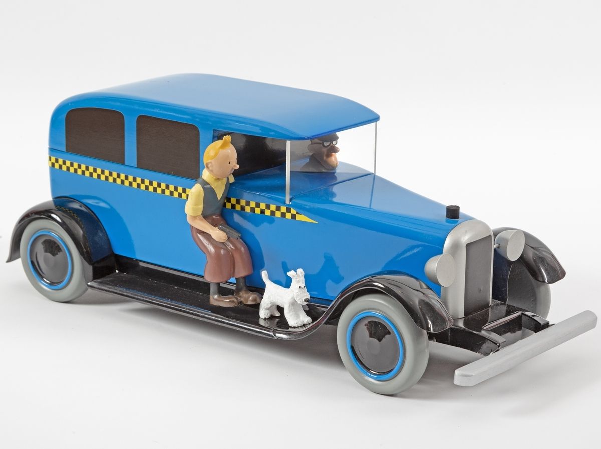 Hergé : AROUTCHEFF :丁丁，出租车（H.40），灵感来自芝加哥格子车，丁丁在美国，第一款第二款，人物为树脂，1990年，38厘米，BC标签。