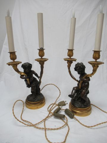 Null D'après CLODION, paire de candélabres en bronze doré, bronze patiné. Montés&hellip;