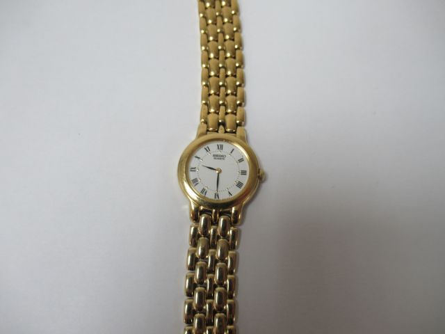 Null SEIKO Lady's watch in gilded metal.