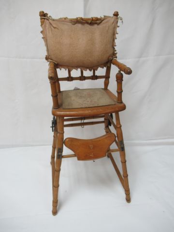 Null Wooden doll's high chair, upholstered with fabric. Circa 1920. Height: 64 c&hellip;